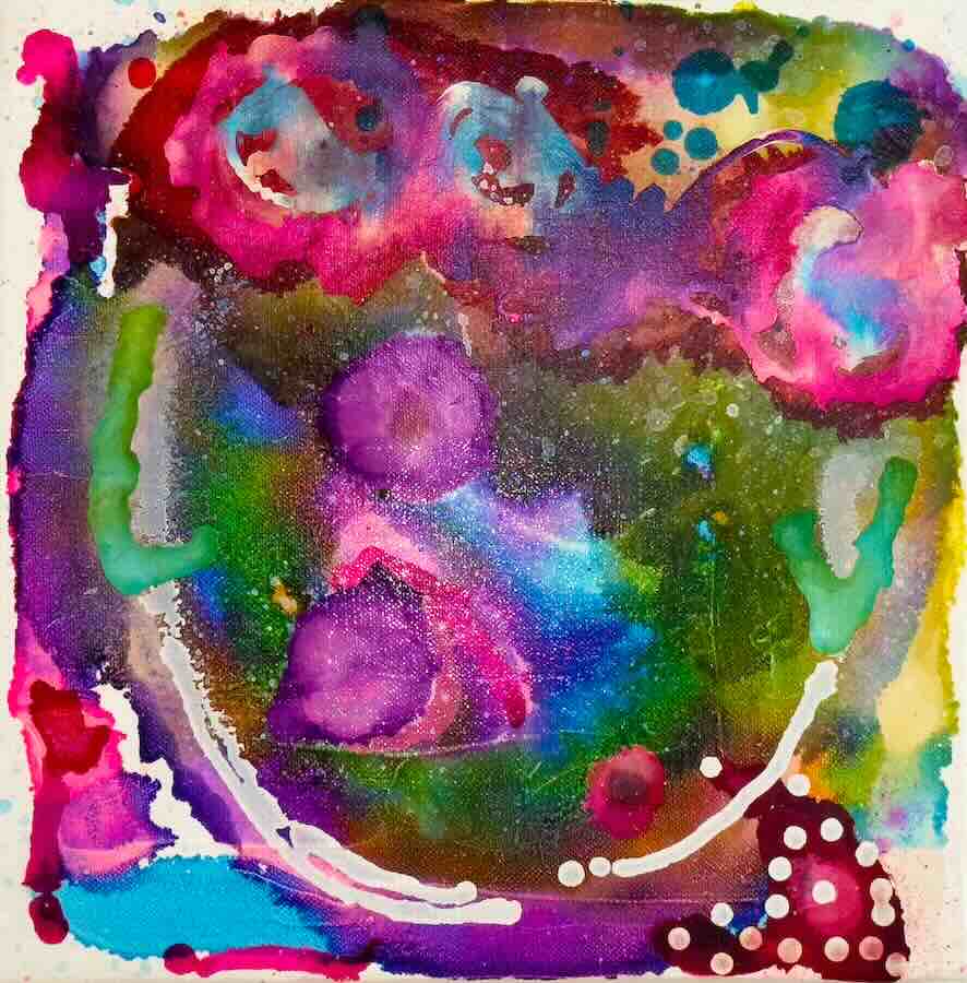 Vibrant abstract watercolor art with colorful swirls.